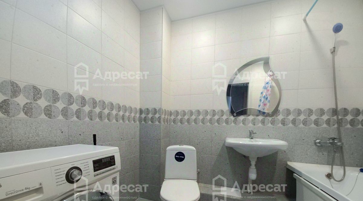 квартира г Волгоград р-н Дзержинский ул им. Расула Гамзатова 21 фото 1