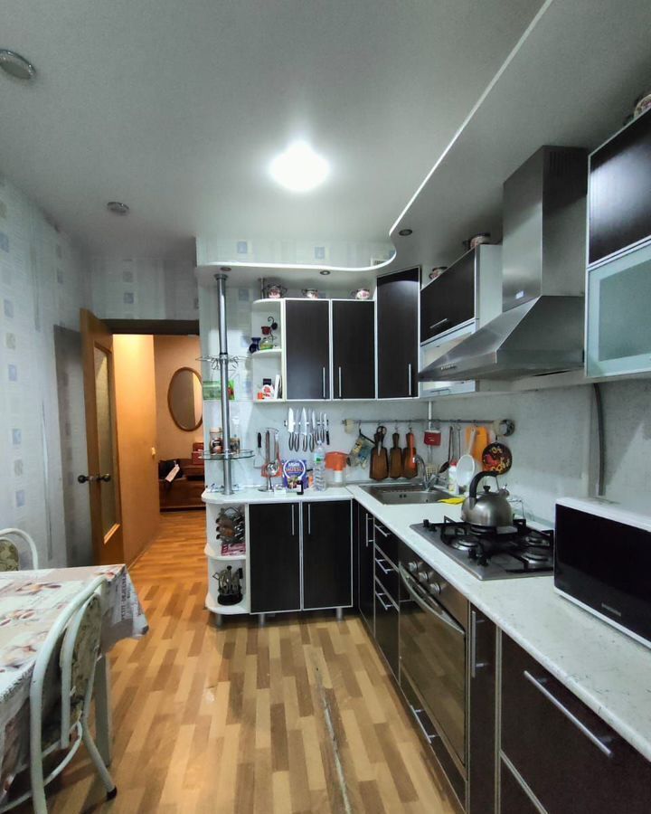 квартира г Волгоград р-н Дзержинский ул Шекснинская 8а фото 20