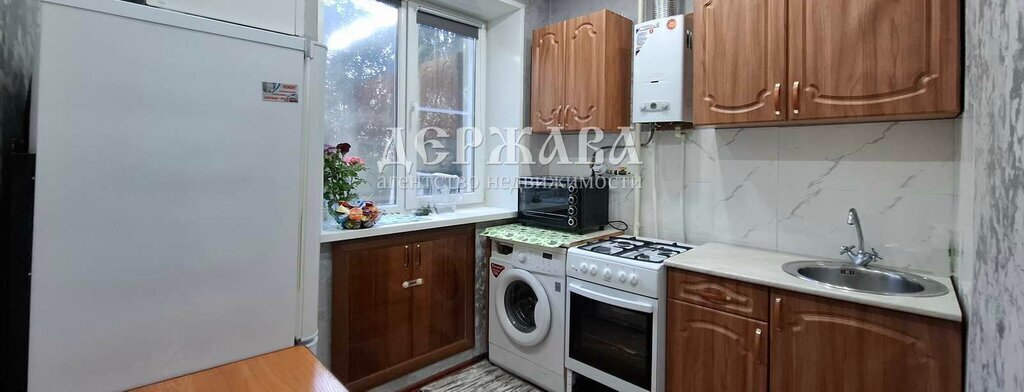 квартира г Старый Оскол ул Комсомольская 42 фото 2