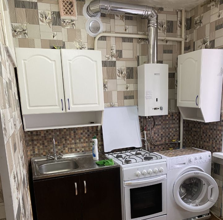 квартира г Волгоград р-н Ворошиловский ул им. милиционера Буханцева 52 фото 4